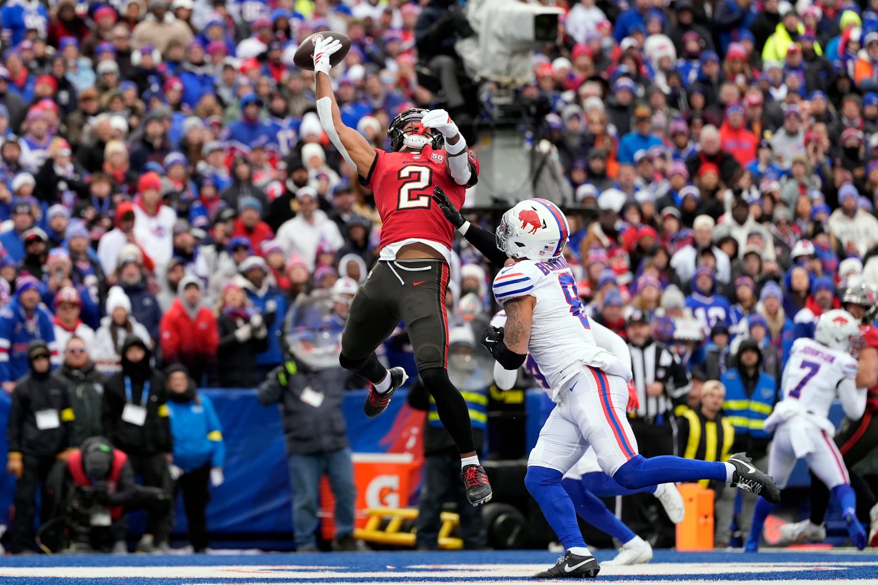 Tampa Bay Buccaneers wide receiver Emeka Egbuka (2) cannot make a catch against Buffalo Bills linebacker Terrel Bernard (8) during the first half of an NFL football game, Sunday, Nov. 16, 2025, in Orchard Park, N.Y. (AP Photo/Carolyn Kaster)