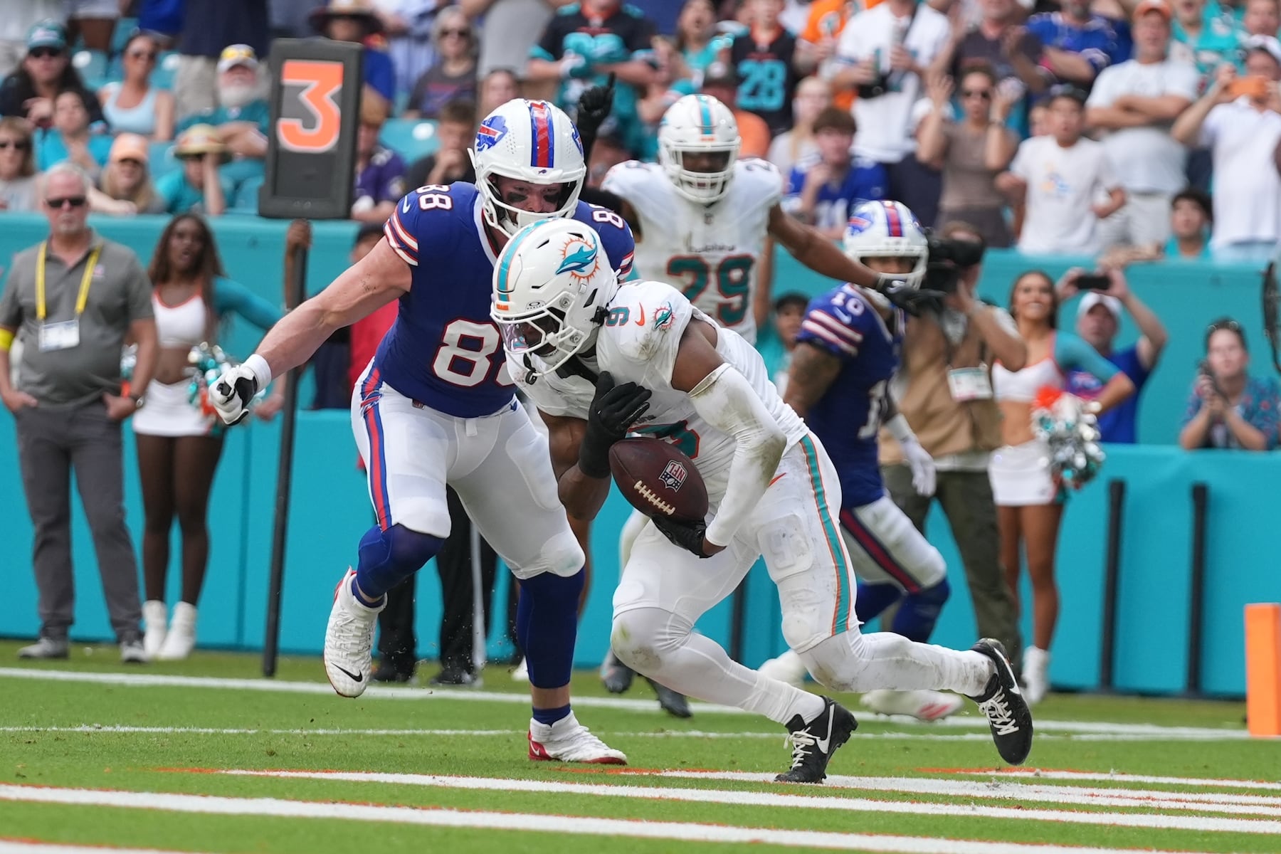 Miami Dolphins safety Ifeatu Melifonwu makes an interception during the second half of an NFL football game against the Buffalo Bills, Sunday, Nov. 9, 2025, in Miami Gardens, Fla. (AP Photo/Lynne Sladky)