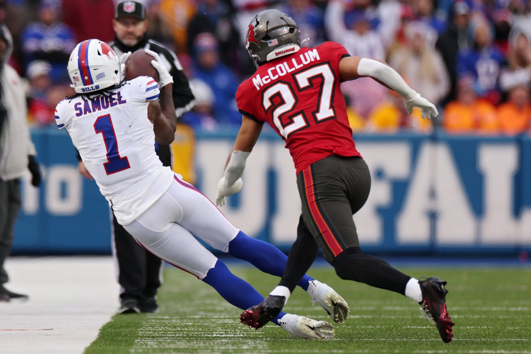 ORCHARD PARK, NEW YORK - NOVEMBER 16: Curtis Samuel #1 of the Buffalo Bills catches a pass against Zyon McCollum #27 of the Tampa Bay Buccaneers during the fourth quarter at Highmark Stadium on November 16, 2025 in Orchard Park, New York. (Photo by Bryan M. Bennett/Getty Images)