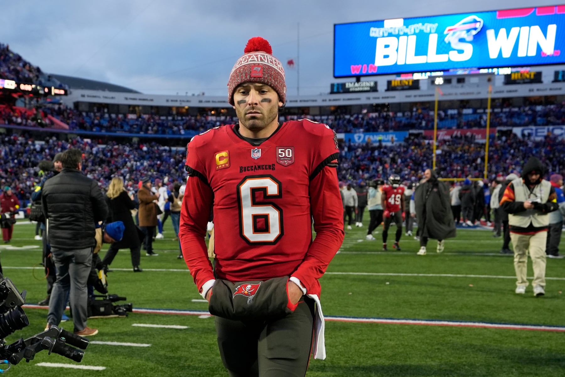 Tampa Bay Buccaneers quarterback Baker Mayfield leaves the field after an NFL football game against the Buffalo Bills, Sunday, Nov. 16, 2025, in Orchard Park, N.Y. (AP Photo/Carolyn Kaster)