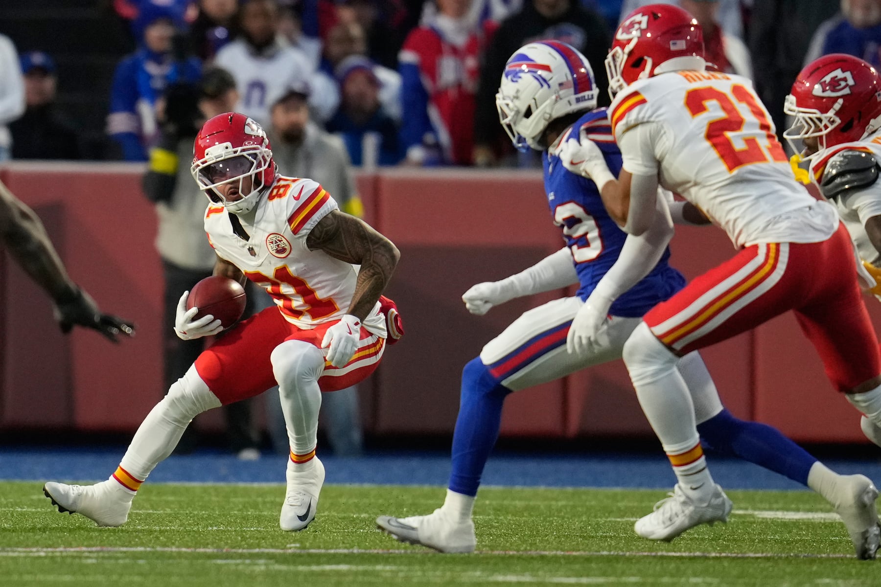 Kansas City Chiefs wide receiver Nikko Remigio (81) runs with the ball during the first half of an NFL football game against the Buffalo Bills Sunday, Nov. 2, 2025, in Orchard Park. N.Y. (AP Photo/Sue Ogrocki)