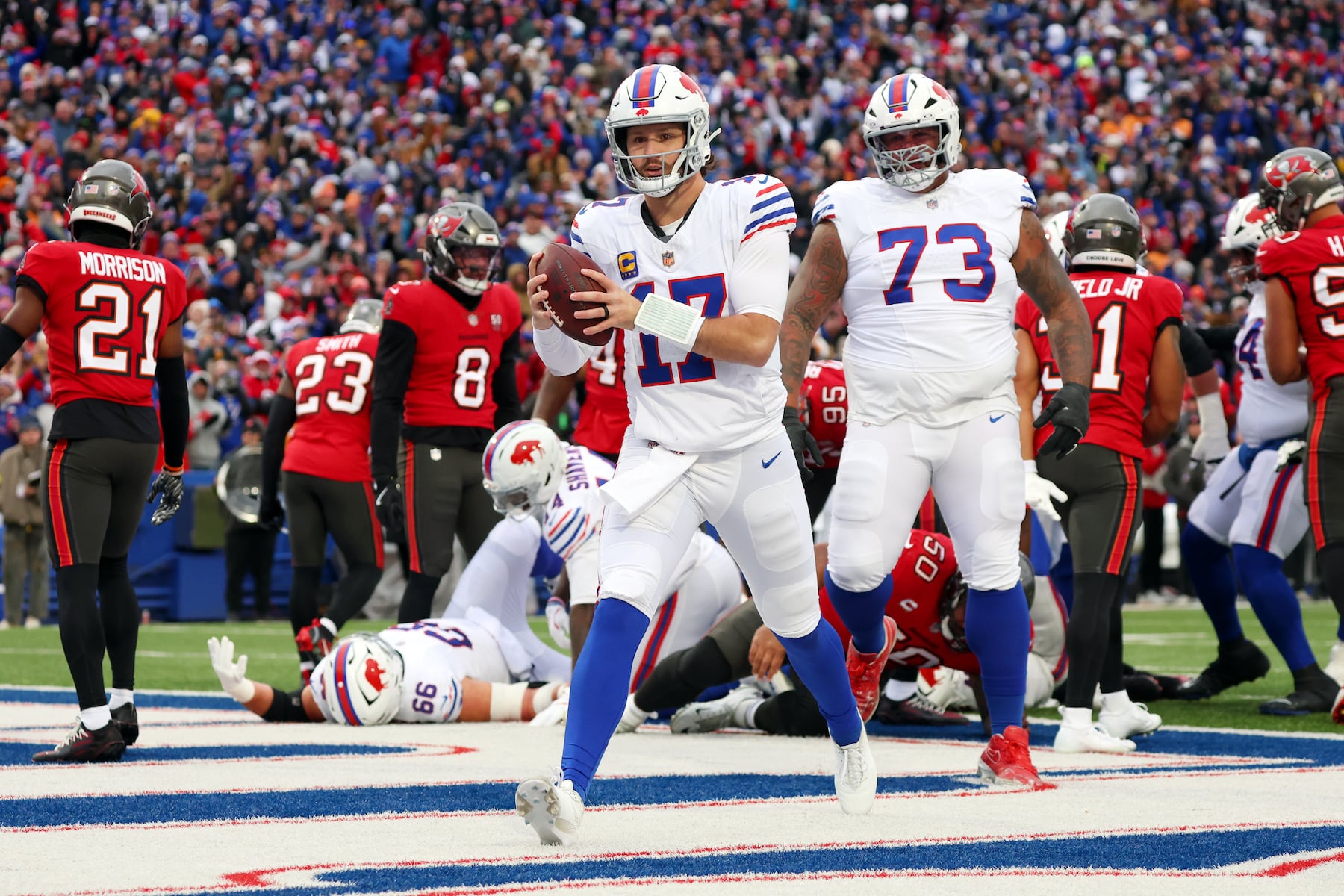 Buffalo Bills quarterback Josh Allen (17) reacts after scoring a touchdown against the Tampa Bay Buccaneers during the first half of an NFL football game, Sunday, Nov. 16, 2025, in Orchard Park, N.Y. (AP Photo/Jeffrey T. Barnes)