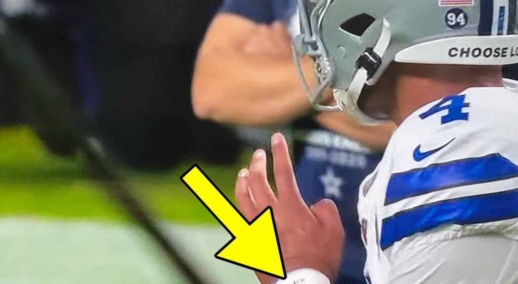 Dak Prescott warming up.