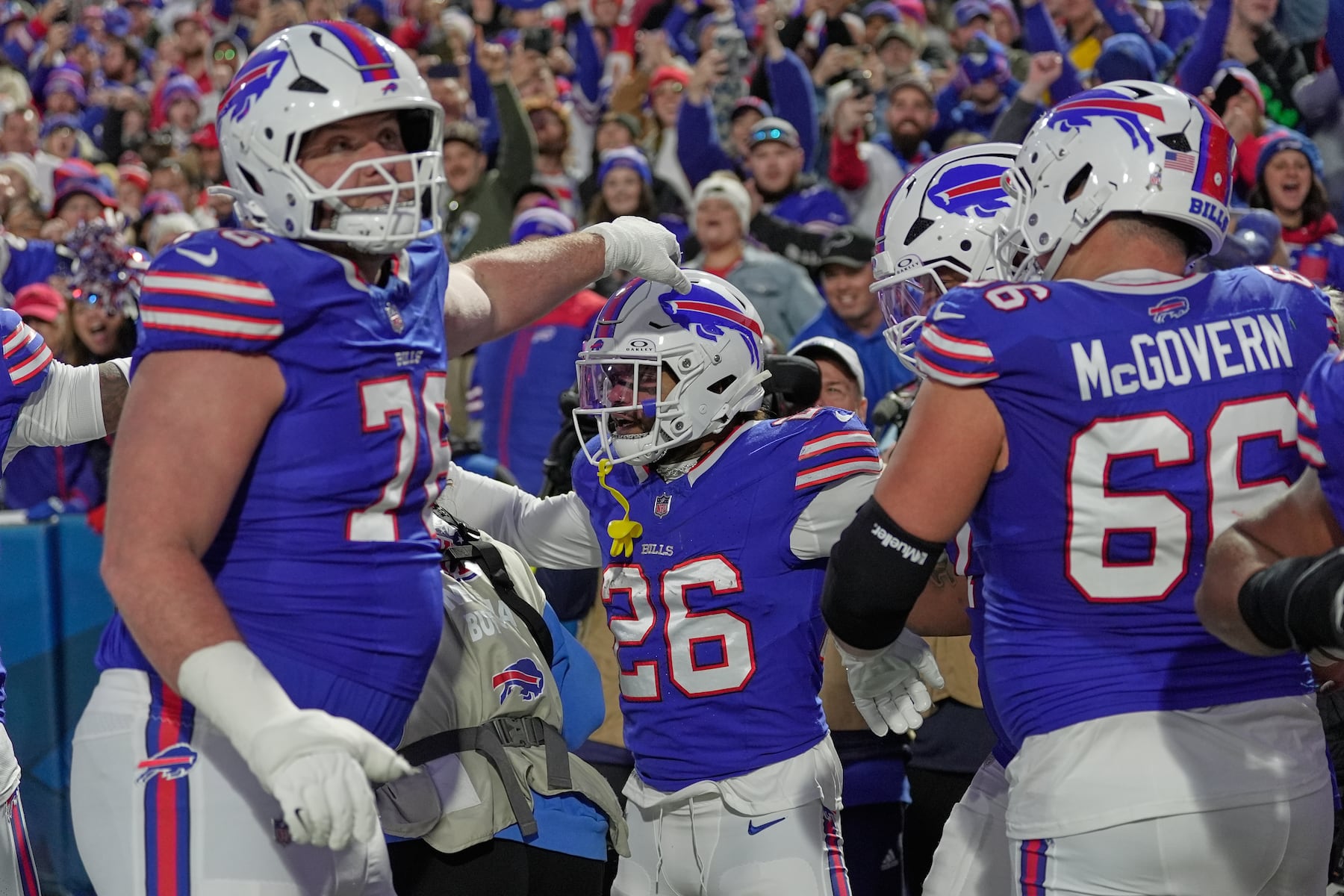Buffalo Bills running back Ty Johnson (26) celebrates after scoring during the first half of an NFL football game against the Kansas City Chiefs Sunday, Nov. 2, 2025, in Orchard Park. N.Y. (AP Photo/Sue Ogrocki)