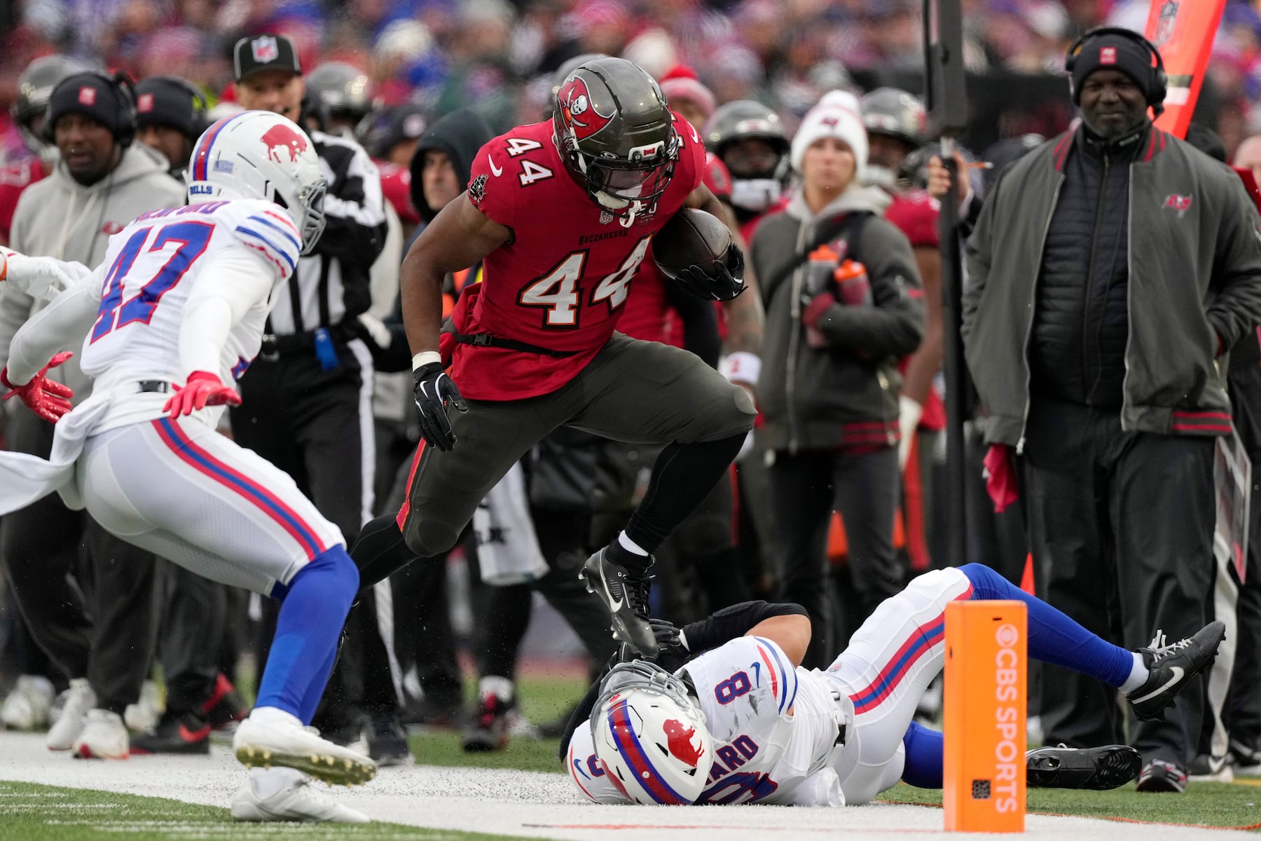 Tampa Bay Buccaneers running back Sean Tucker (44) runs against Buffalo Bills linebacker Terrel Bernard (8) during the first half of an NFL football game, Sunday, Nov. 16, 2025, in Orchard Park, N.Y. (AP Photo/Carolyn Kaster)