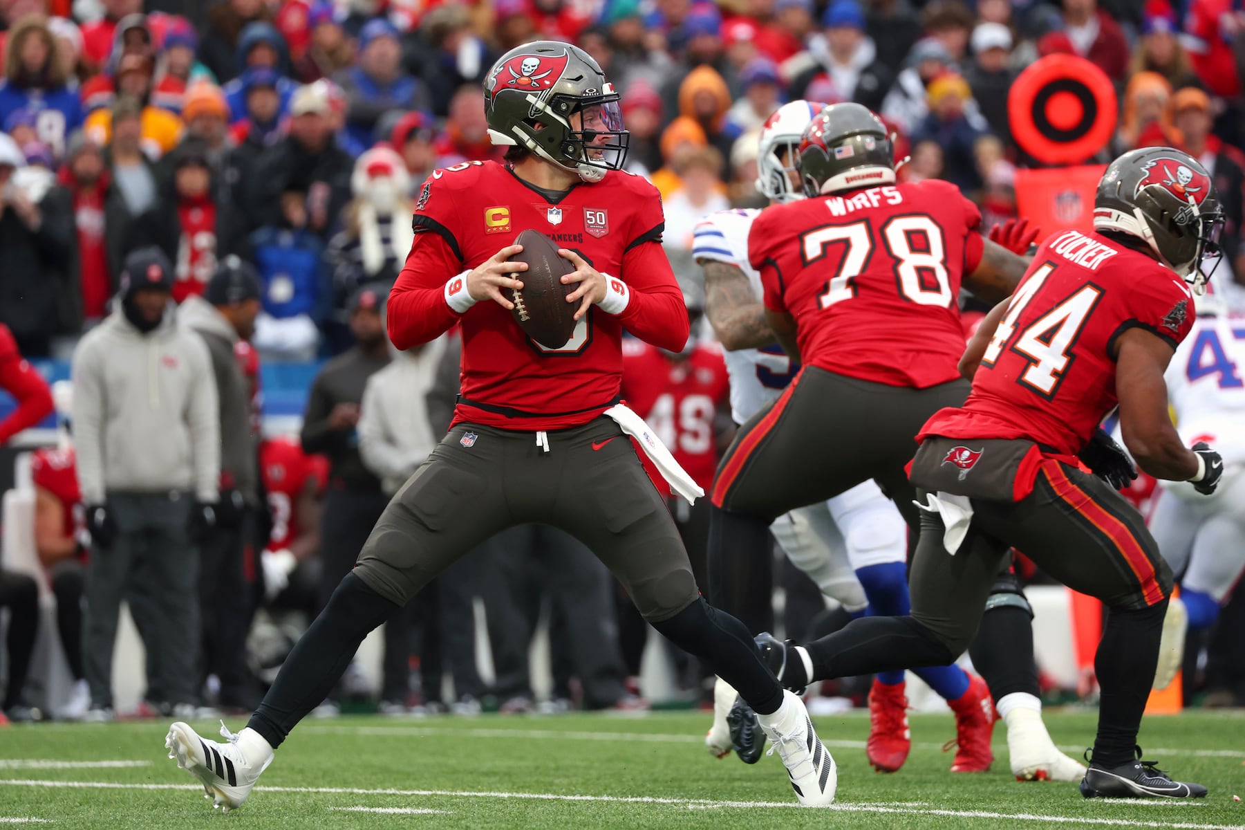 Tampa Bay Buccaneers quarterback Baker Mayfield (6) looks to pass against the Buffalo Bills during the first half of an NFL football game, Sunday, Nov. 16, 2025, in Orchard Park, N.Y. (AP Photo/Jeffrey T. Barnes)