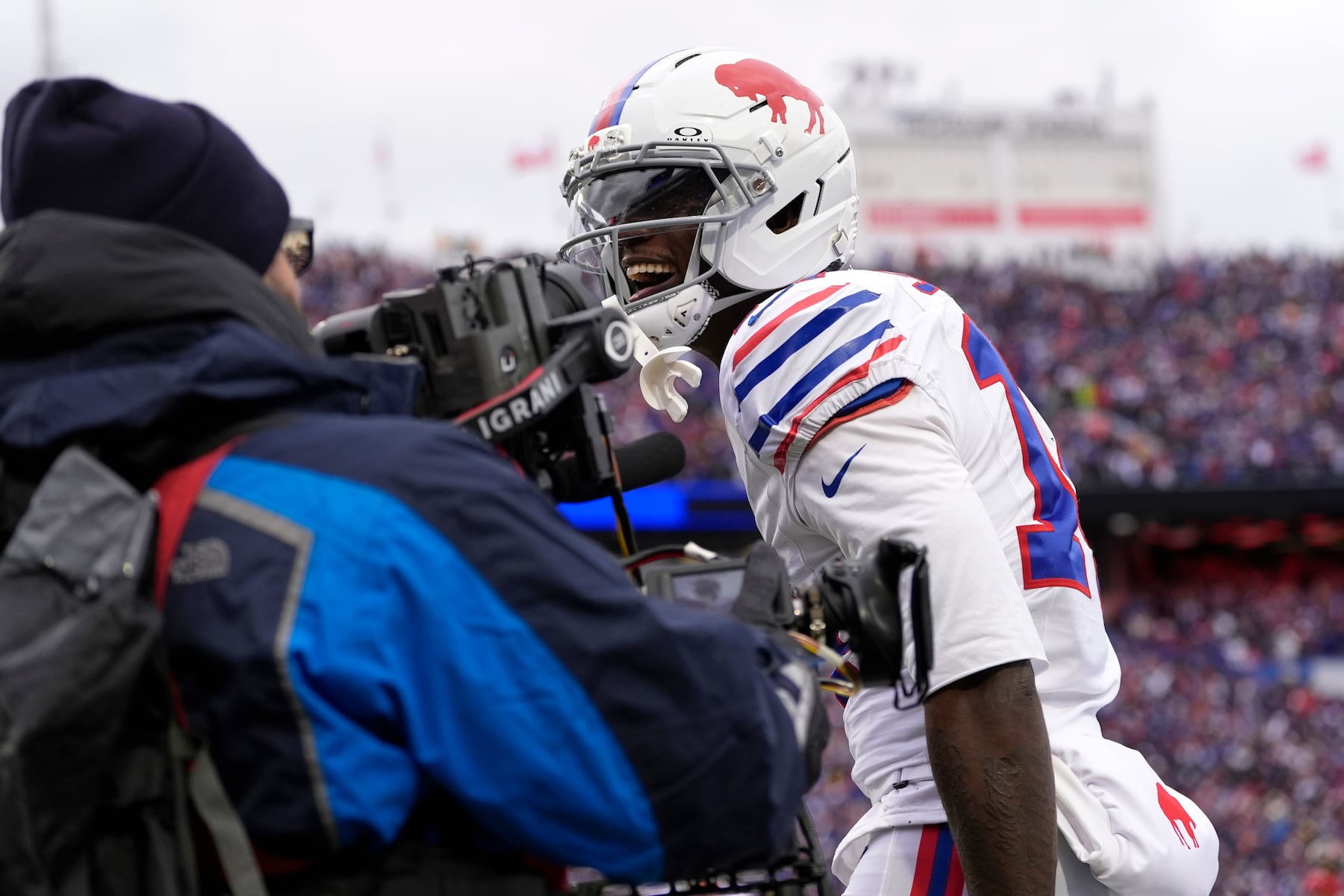 Buffalo Bills wide receiver Tyrell Shavers (14) celebrates after scoring a touchdown against the Tampa Bay Buccaneers during the first half of an NFL football game, Sunday, Nov. 16, 2025, in Orchard Park, N.Y. (AP Photo/Carolyn Kaster)
