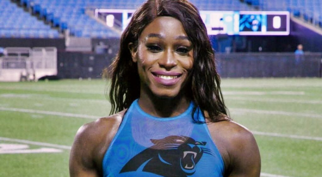 Justine Lindsay posing in Panthers gear