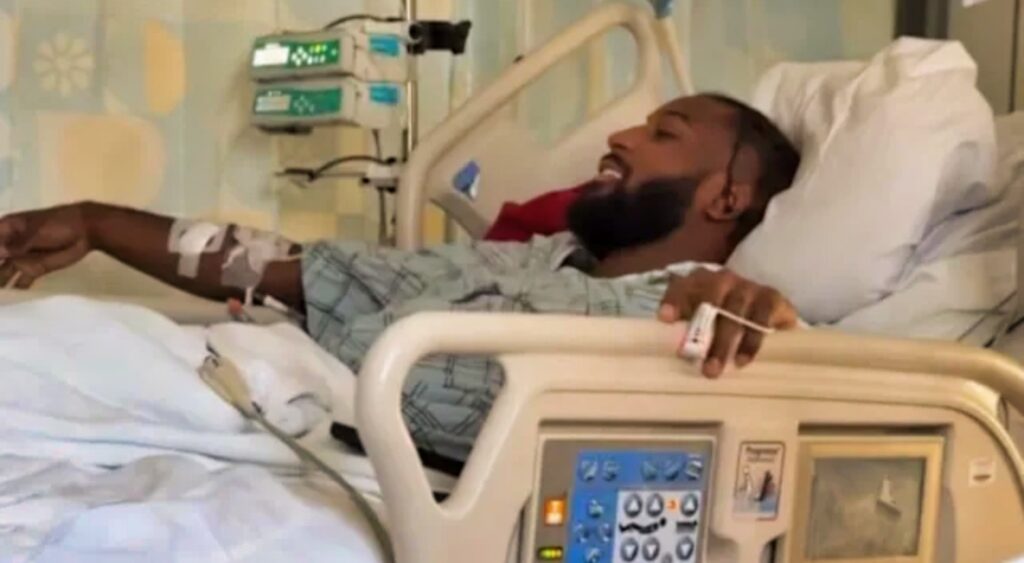 Kris Boyd in hospital bed