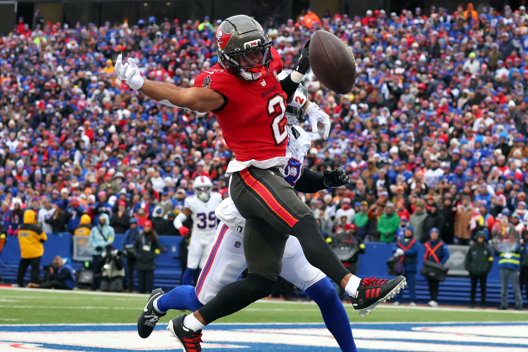 Tampa Bay Buccaneers wide receiver Emeka Egbuka (2) cannot make a catch against Buffalo Bills linebacker Terrel Bernard (8) during the first half of an NFL football game, Sunday, Nov. 16, 2025, in Orchard Park, N.Y. (AP Photo/Jeffrey T. Barnes)