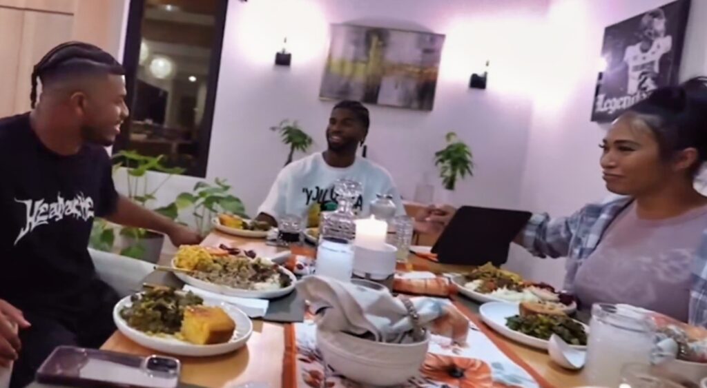 Shilo Sanders at the table with his family for Thanksgiving