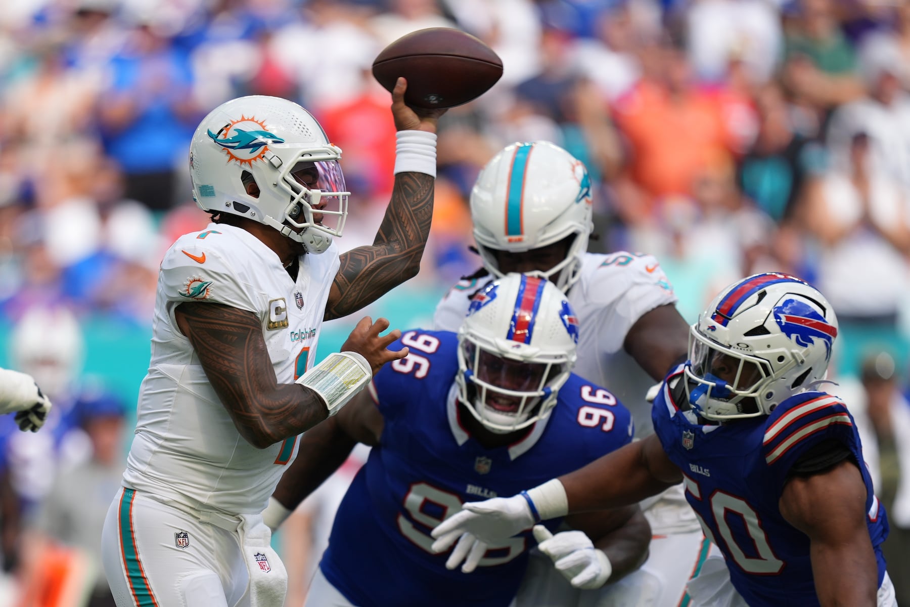 Miami Dolphins quarterback Tua Tagovailoa throws during the first half of an NFL football game against the Buffalo Bills, Sunday, Nov. 9, 2025, in Miami Gardens, Fla. (AP Photo/Rebecca Blackwell)