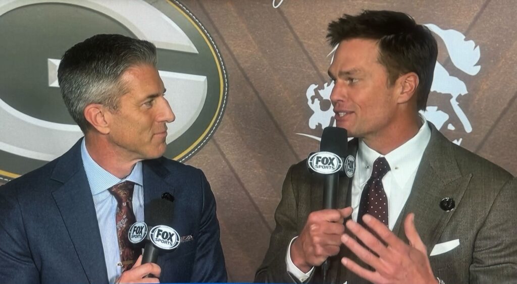 Kevin Burkhardt and Tom Brady