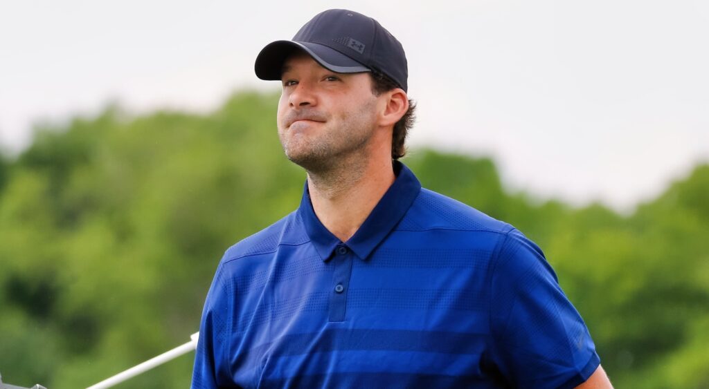 Tony Romo looking on.