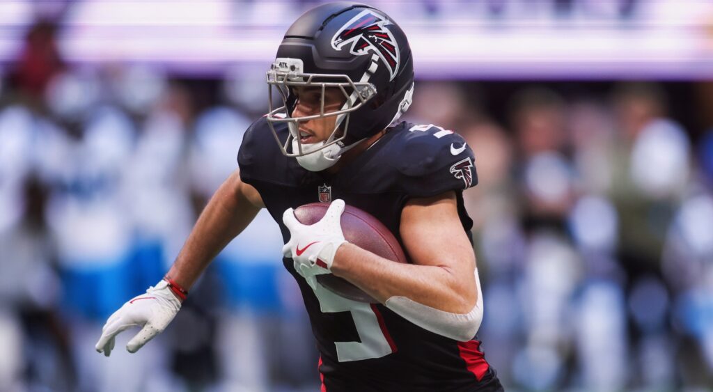 Drake London running with football