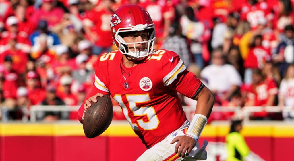 Patrick Mahomes looking on.