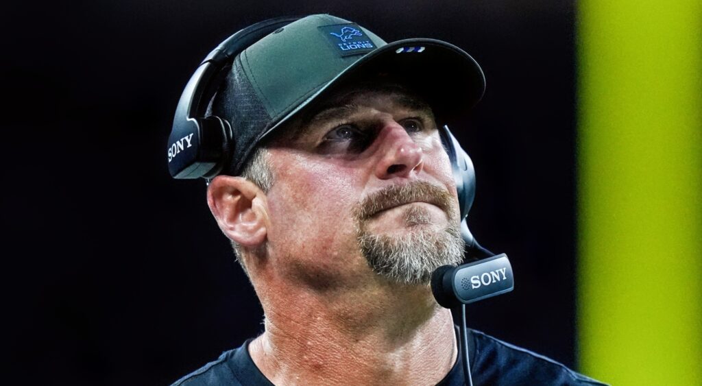 Dan Campbell of Detroit Lions looking on.