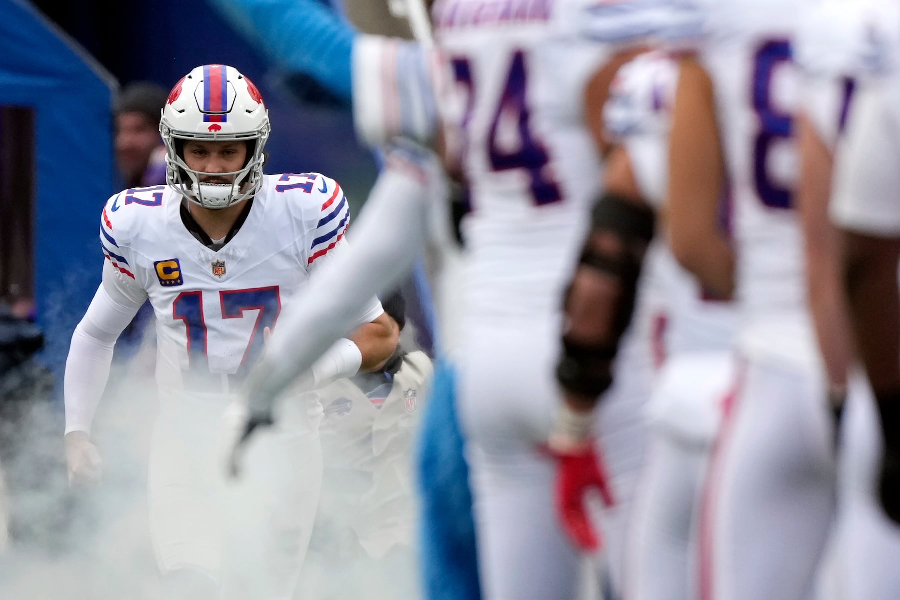 Buffalo Bills quarterback Josh Allen (17) runs on field during introductions before the first half of an NFL football game against the Tampa Bay Buccaneers, Sunday, Nov. 16, 2025, in Orchard Park, N.Y. (AP Photo/Carolyn Kaster)
