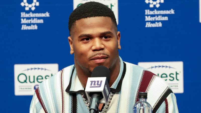 Abdul Carter at the podium