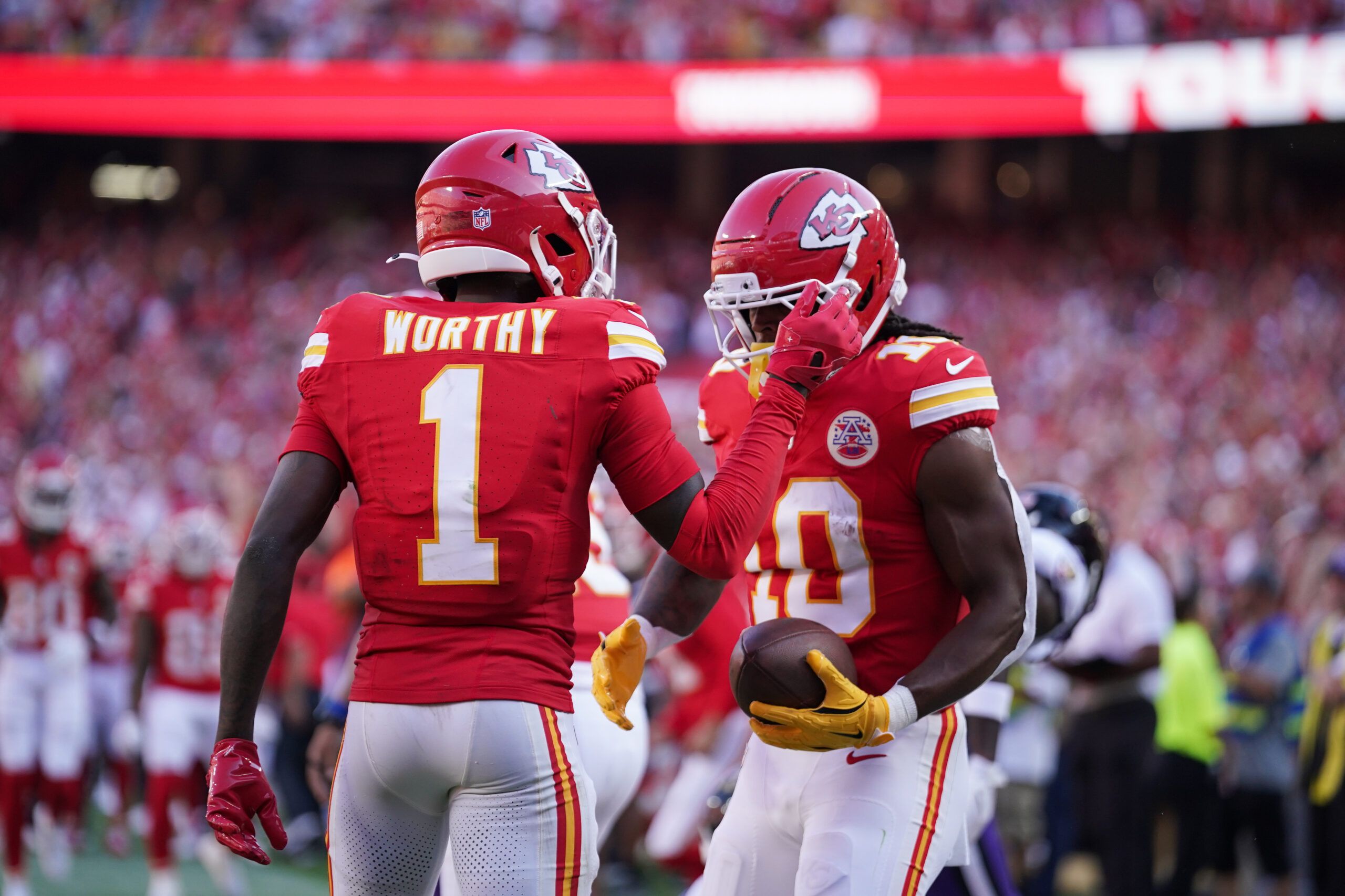 Kansas City Chiefs running back Isiah Pacheco (10) celebrates with Kansas City Chiefs wide receiver Xavier Worthy (1) after scoring a touchdown during the second quarter against the Baltimore Ravens at GEHA Field at Arrowhead Stadium.