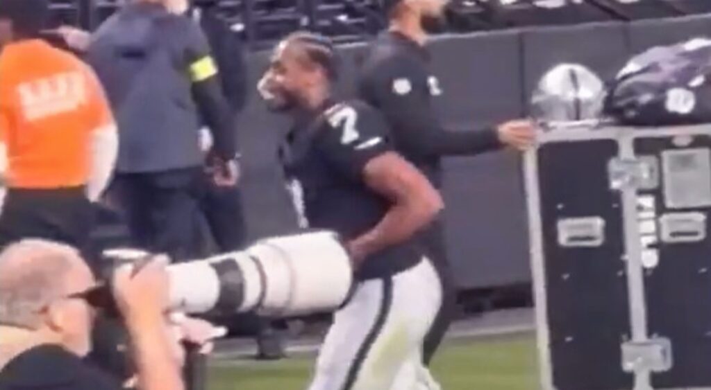 Geno Smith walking off the field.
