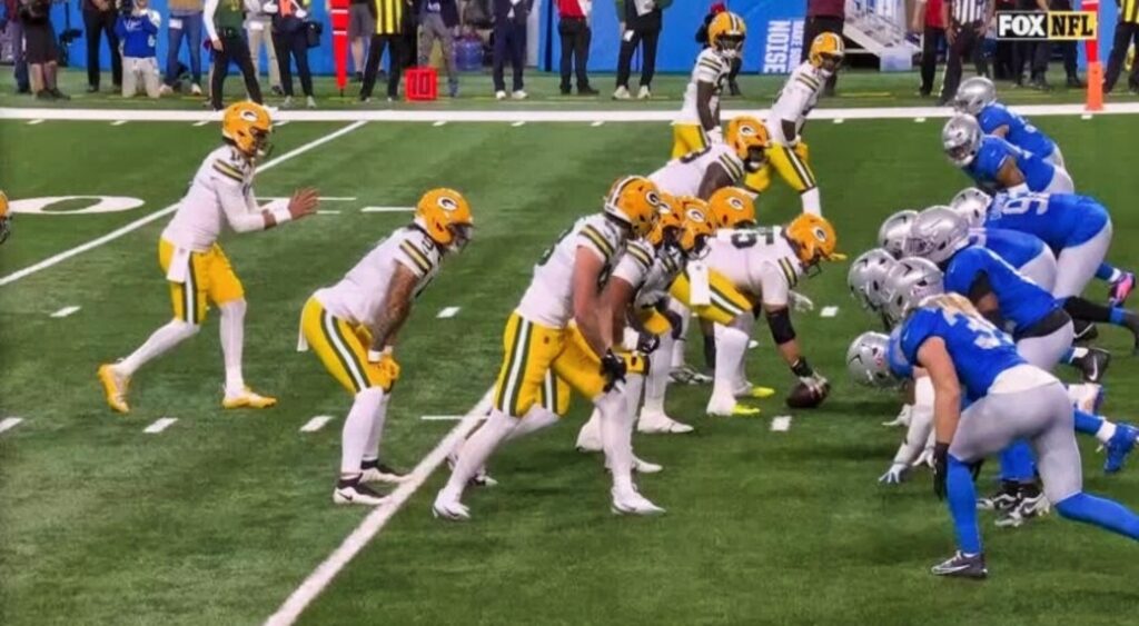 Green Bay Packers calling a play vs. the Detroit Lions. The NFL refs made several questionable calls.
