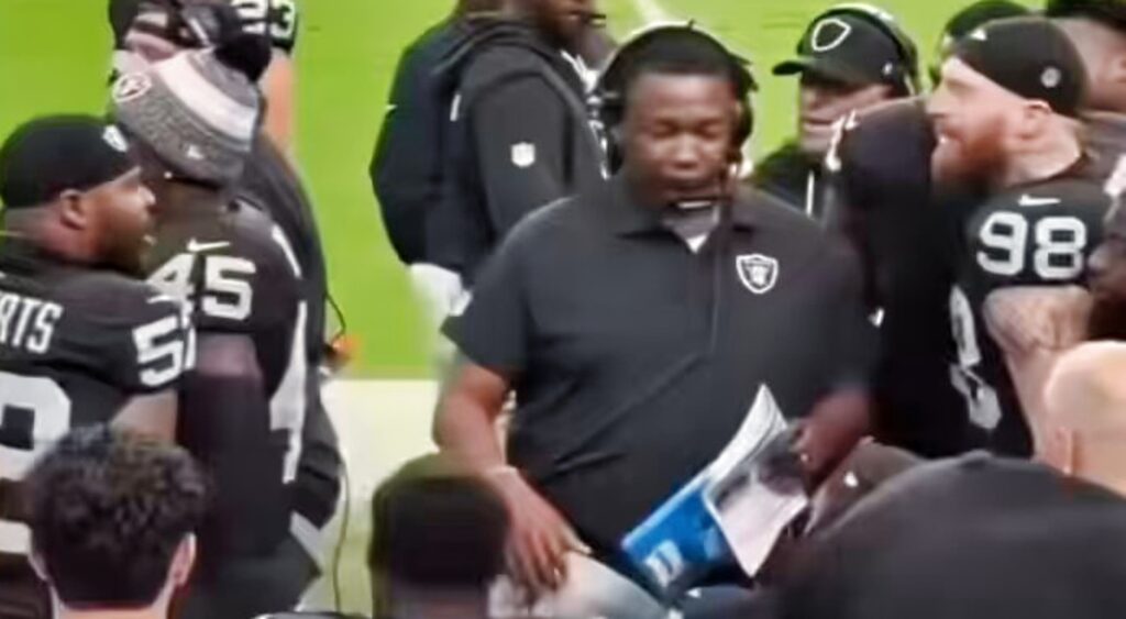 Maxx Crosby talking to Elandon Roberts.