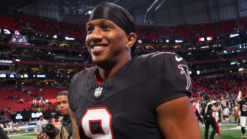 Michael Penix Jr. smiles after a game