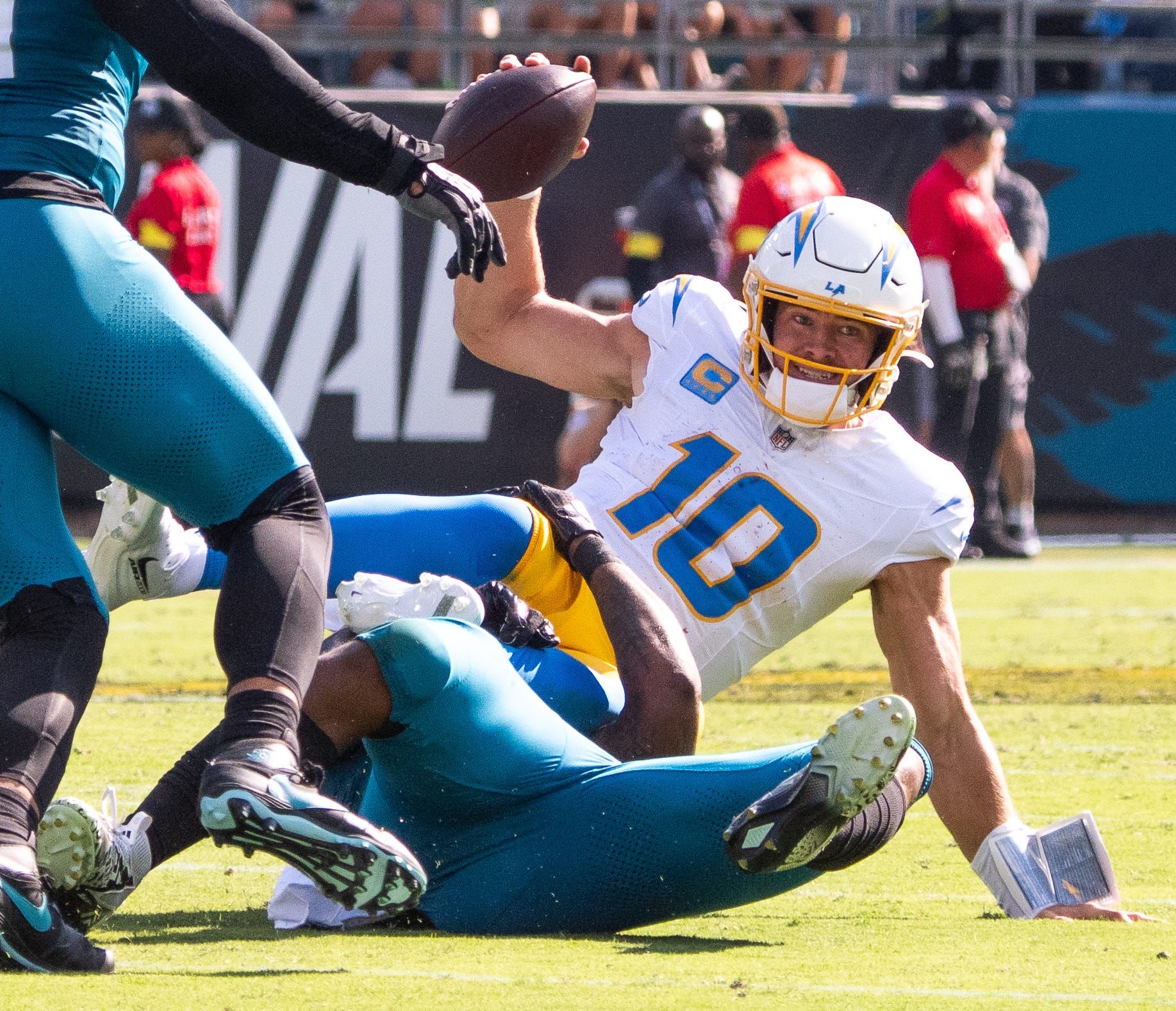 Jacksonville Jaguars defensive end Josh Hines-Allen (41) sacks Los Angeles Chargers quarterback Justin Herbert (10) in the second quarter, breaking a franchise record for sacks in an NFL football game at EverBank Stadium, Sunday, November 16, 2025, in Jacksonville, Fla. [Doug Engle/Florida Times-Union]