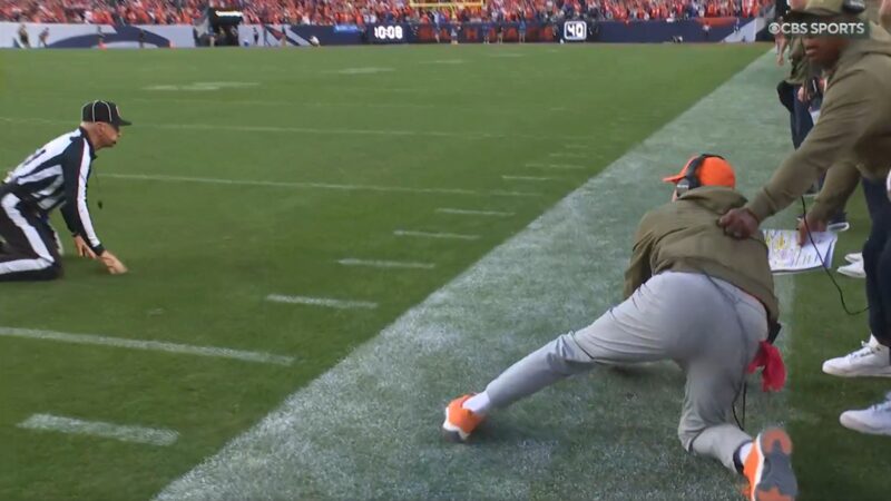 Sean Payton colliding with a referee