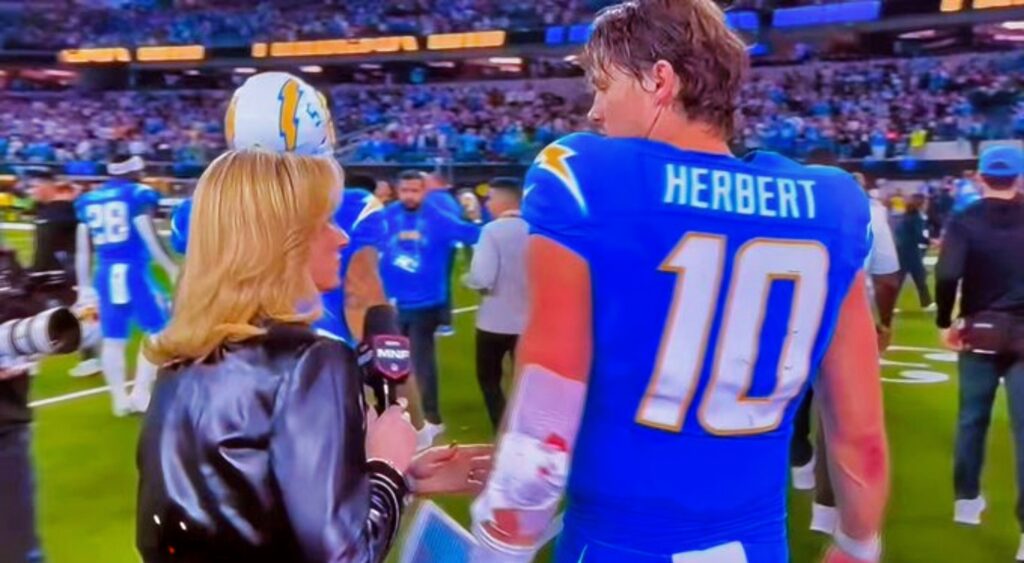 Justin Herbert and Laura Rutledge