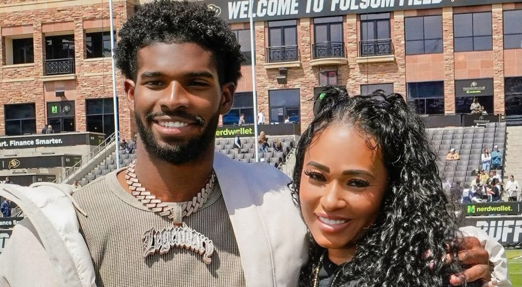 Shedeur Sanders posing with his mother