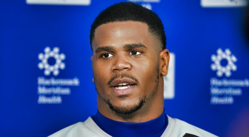 Abdul Carter talking to reporters