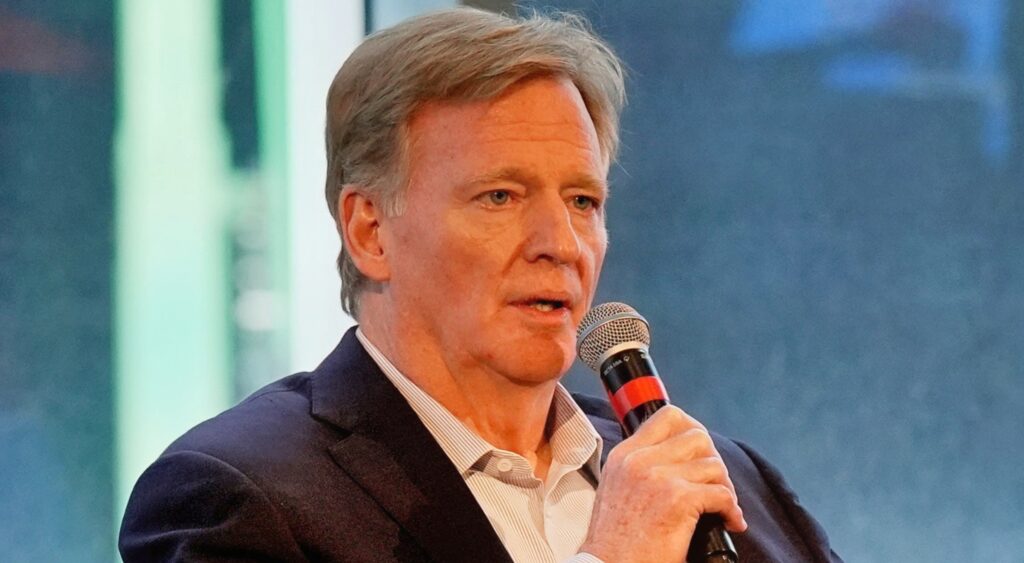 Roger Goodell speaking into mic