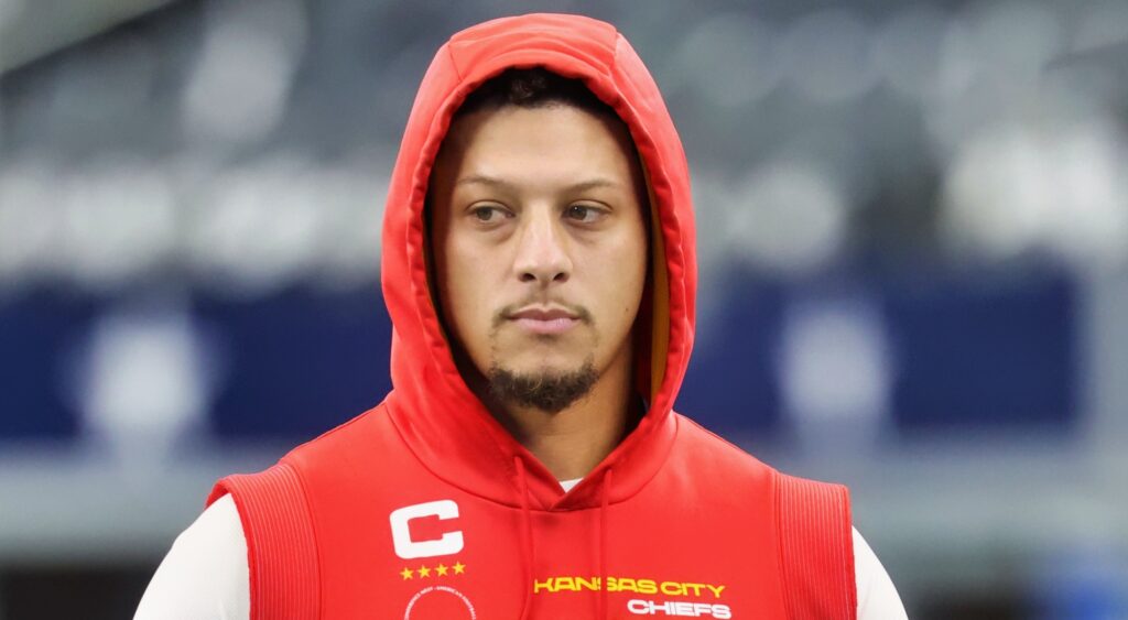 Patrick Mahomes looking on.