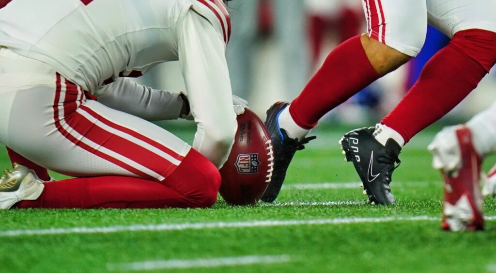 kick attempt on NFL stadium turf