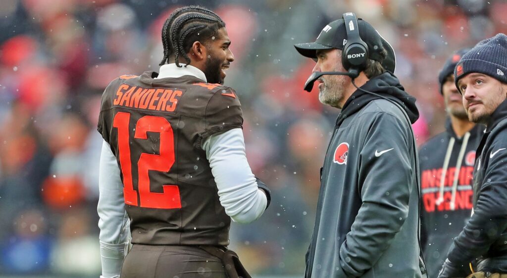 Kevin Stefanski and Shedeur Sanders on the sidelines