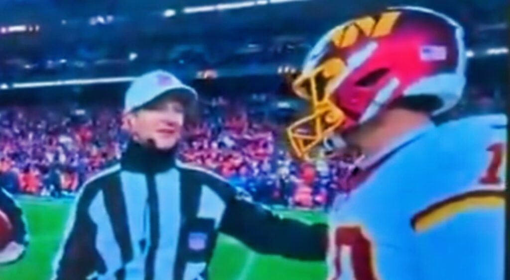 Washington Commanders Punter Tress Way talking to ref