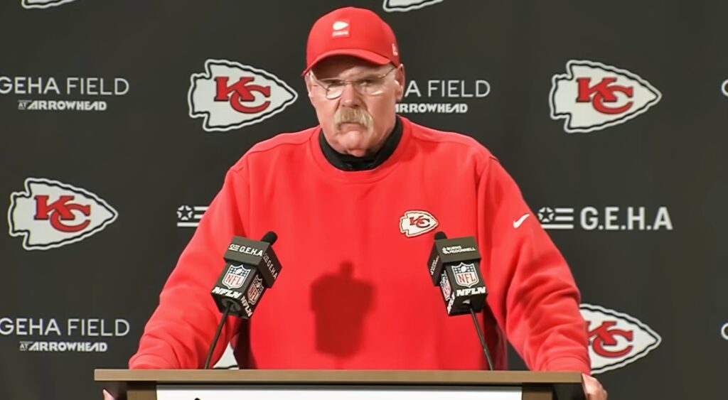 Andy Reid looking on.
