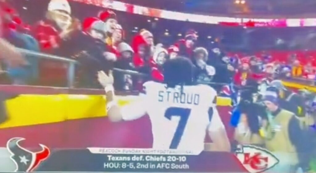 C.J. Stroud looking on.