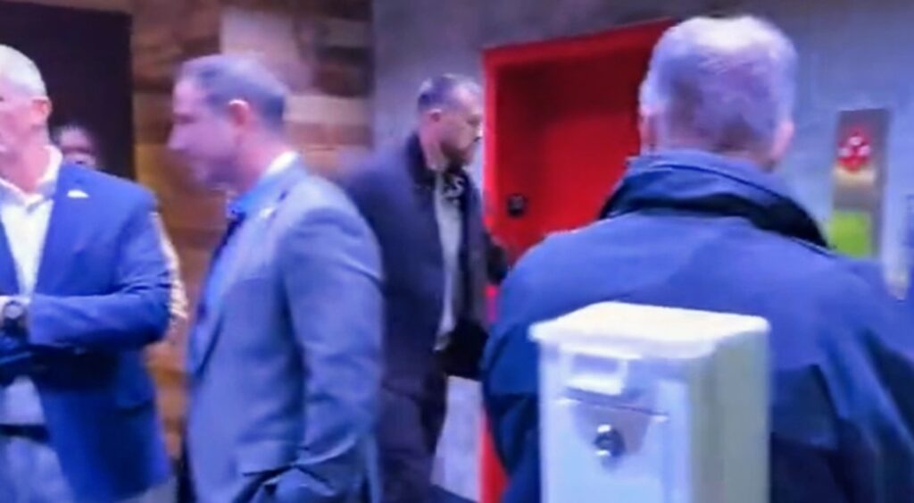 Travis Kelce walking away.